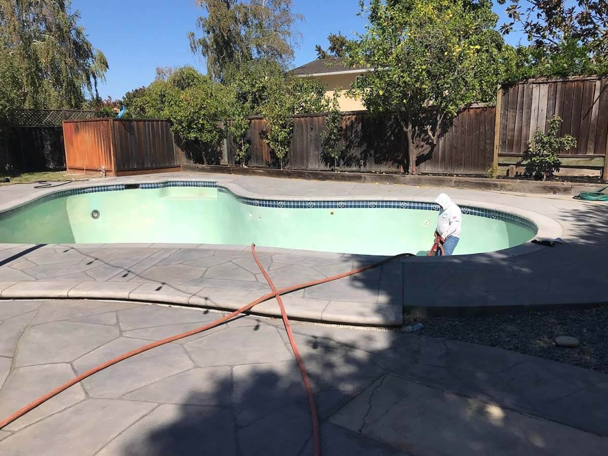 Stan is working on demolishing a pool